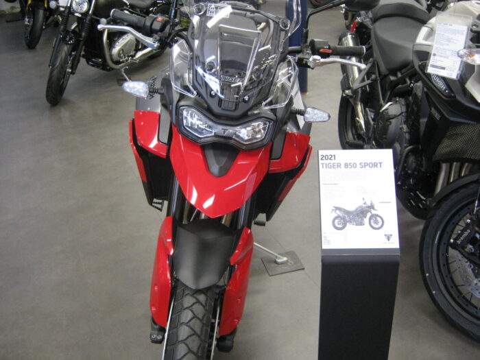 front view of a 2021 Triumph Tiger 850 Sport in Graphite and Diablo Red