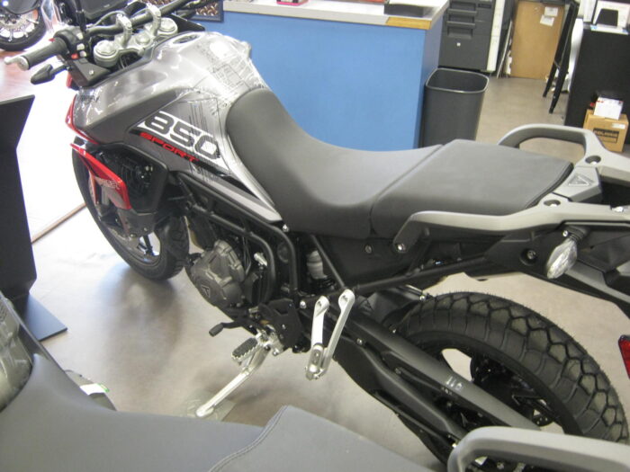 left side of a 2021 Triumph Tiger 850 Sport in Graphite and Diablo Red