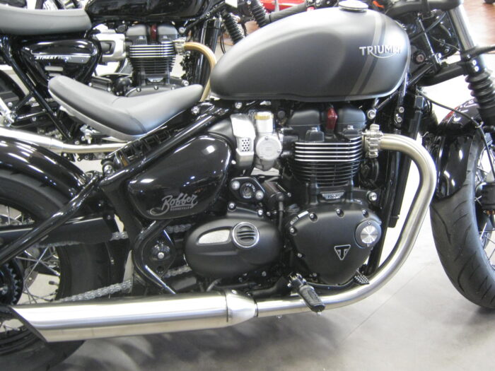 right side of tank on a 2022 Triumph Bonneville Bobber in matte storm grey and ironstone