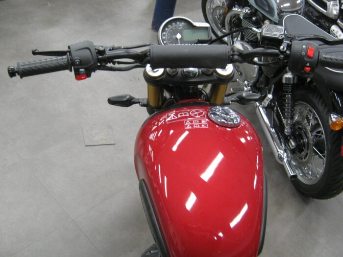 Tank Side View of 2024 Triumph Scrambler 400 X in Carnival Red & Phantom Black at Chesapeake Cycles in Annapolis Maryland