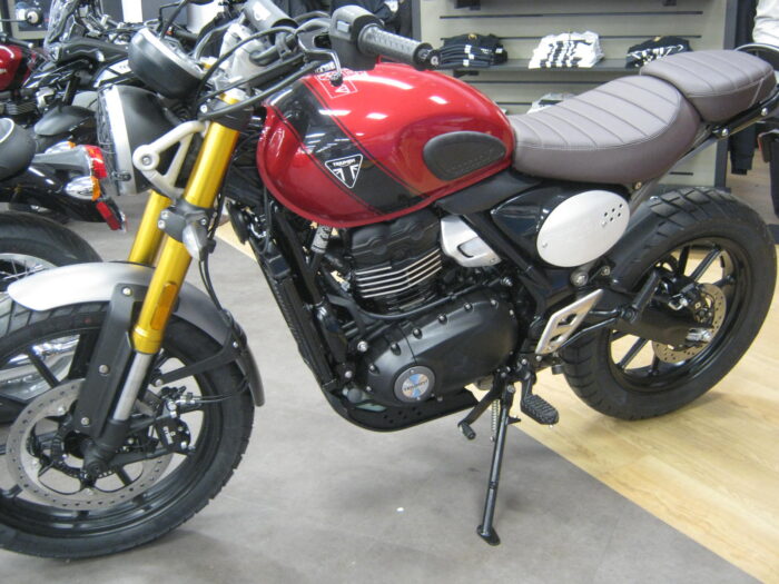 Left Side View of 2024 Triumph Scrambler 400 X in Carnival Red & Phantom Black at Chesapeake Cycles in Annapolis Maryland