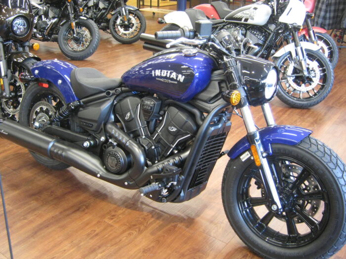 Front right side of 2025 Indian Scout Bobber Limited with Technology Package in Spirit Blue Metallic