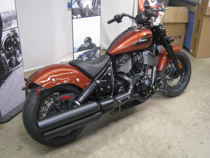 Right side of 2024 Indian Chief Bobber Dark Horse Icon in Copper Metallic Pearl