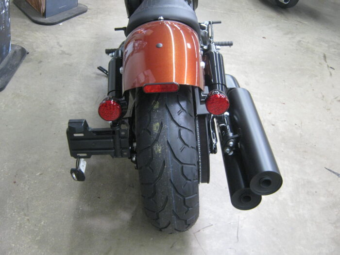 Rear view of 2024 Indian Chief Bobber Dark Horse Icon in Copper Metallic Pearl